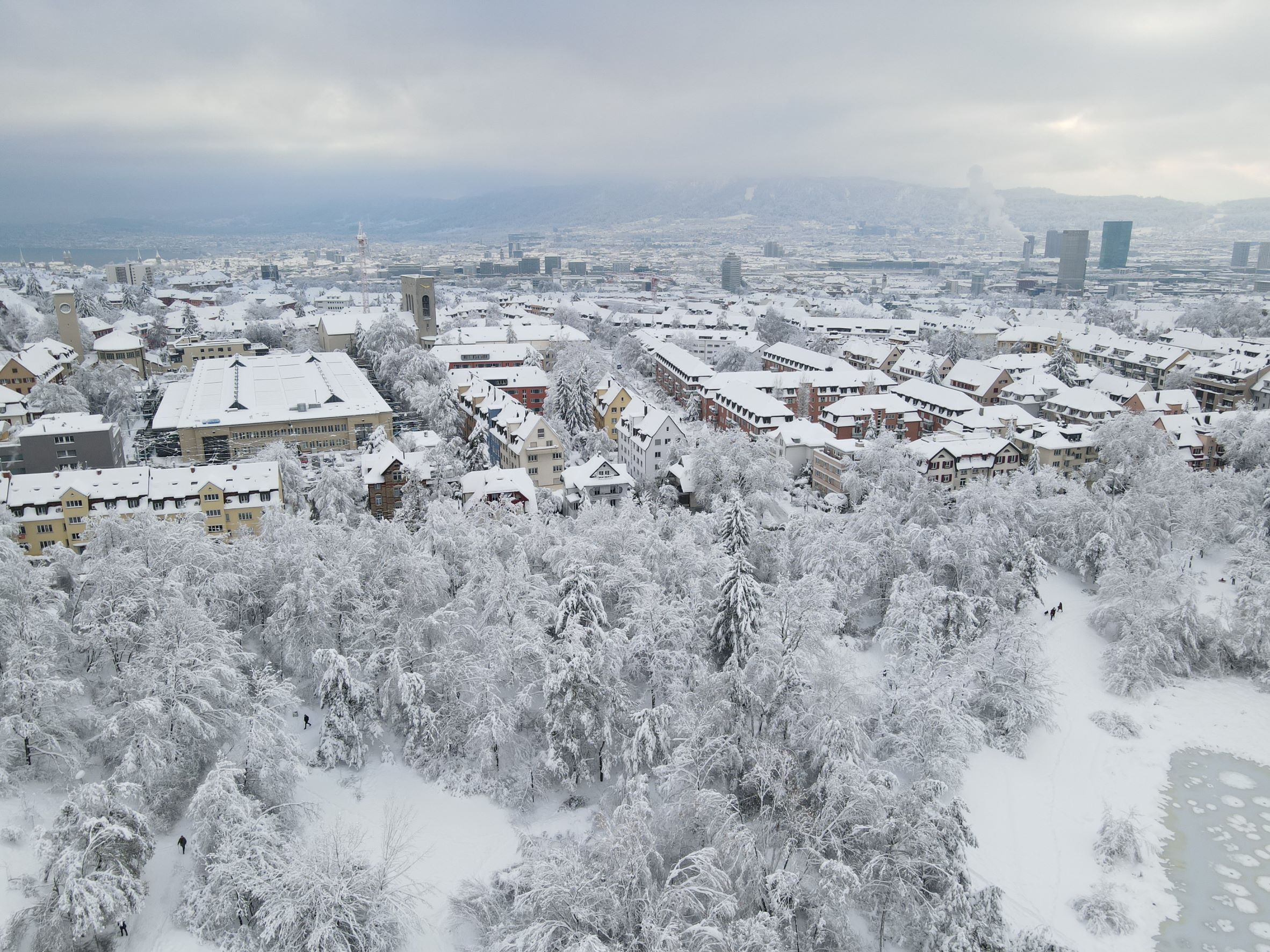 View from UZH Irchel Campus towards Zurich city and lake, a snow world like in a fairy tales. Taken by my drone, on January 15, 2021.